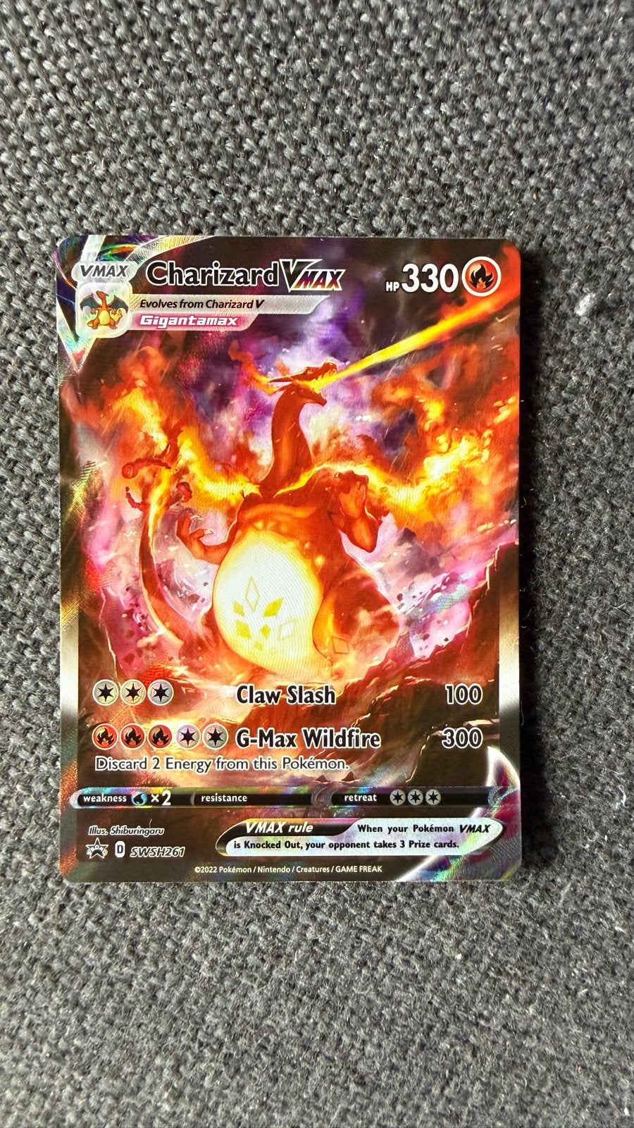 Charizard VMAX Pokémon Kaart SWSH121 Gigantamax, Ophalen of Verzenden, Zo goed als nieuw, Losse kaart