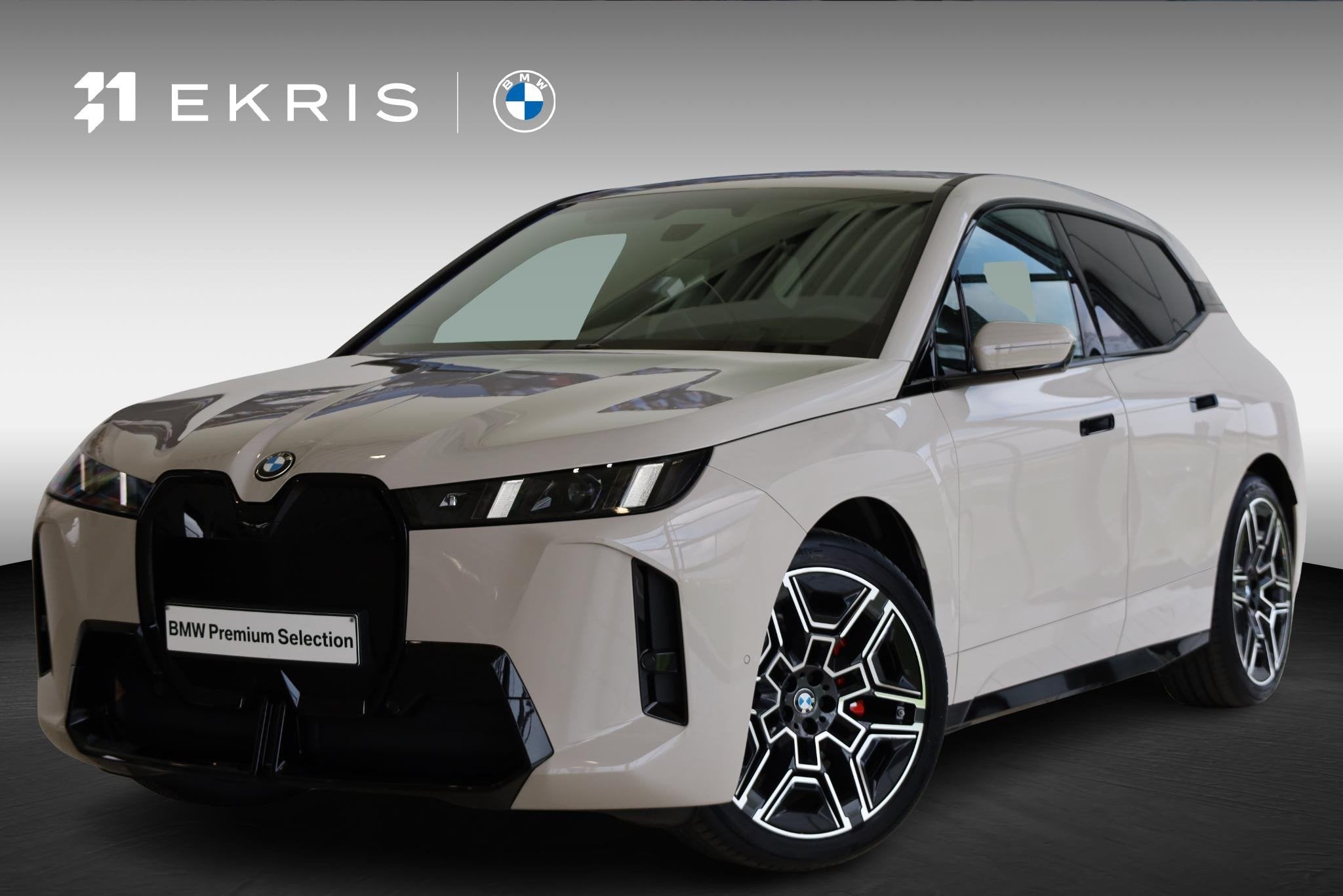BMW iX xDrive60 | M Sportpakket Pro | Harman/Kardon | Drivin, Auto's, BMW, Automaat, Stof, Zwart, Met garantie (alle)