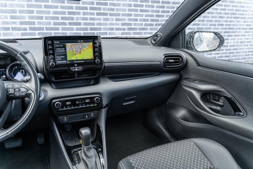 Toyota Yaris 1.5 Hybrid Executive | Panoramadak | JBL Audio, Auto's, Toyota, 450 kg, Gebruikt, Bedrijf, Hybride Elektrisch/Benzine