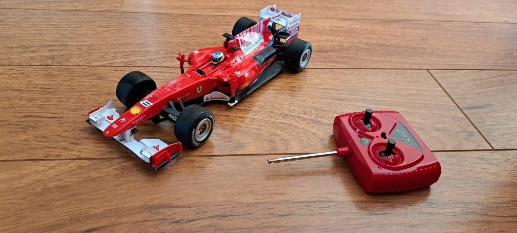 Bestuurbare raceauto Ferrari - goed werkend, Ophalen of Verzenden, Zo goed als nieuw, Afstandsbediening