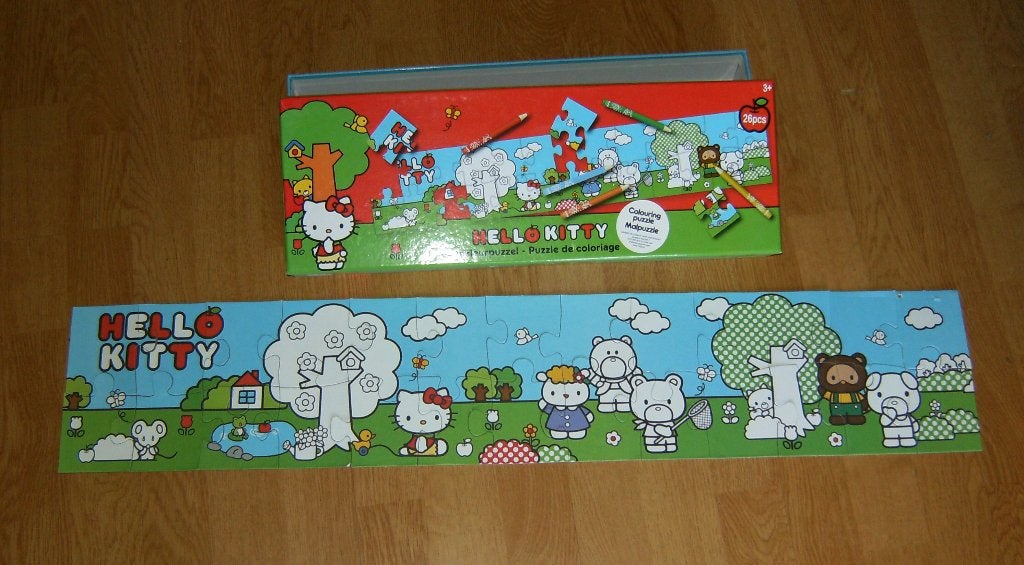 Puzzel en kleurplaat  hello kitty / vloerpuzzel, Ophalen of Verzenden, 10 tot 50 stukjes, Zo goed als nieuw
