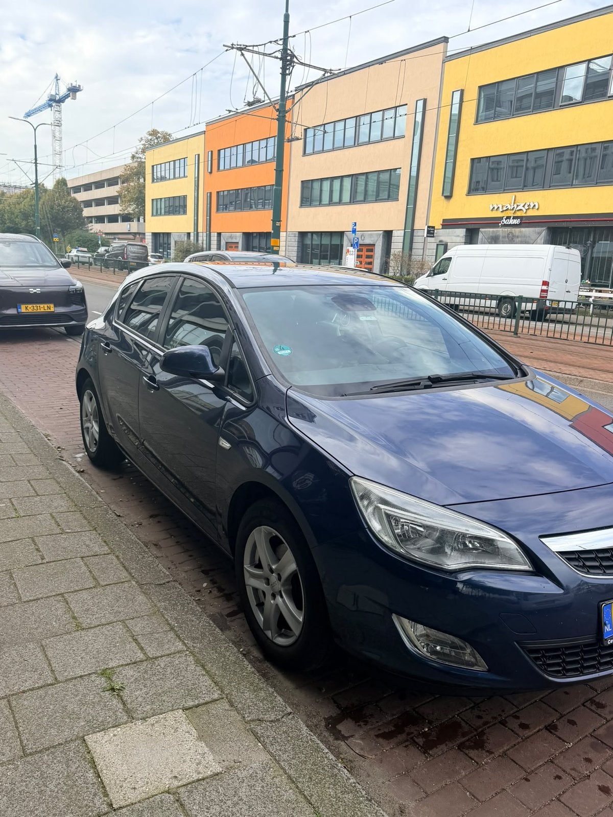 Opel Astra 1.6 Benzine | 2011, Auto's, Voorwielaandrijving, 680 kg, 4 cilinders, Blauw