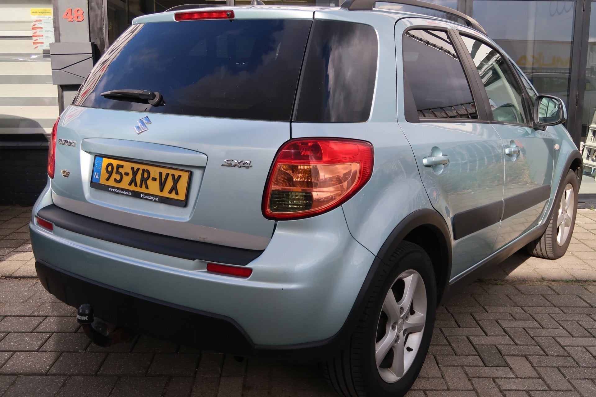 Suzuki SX4 1.6 Shogun *Rijklaarprijs *Trekhaak *NAP, Dealer onderhouden, Gebruikt, Zwart, 4 cilinders