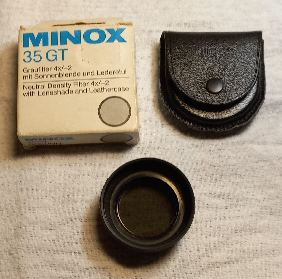 Minox 35GT ND grijs filter met zonnekap en etui, Overige merken, Minder dan 50 mm, Overige typen, Ophalen of Verzenden