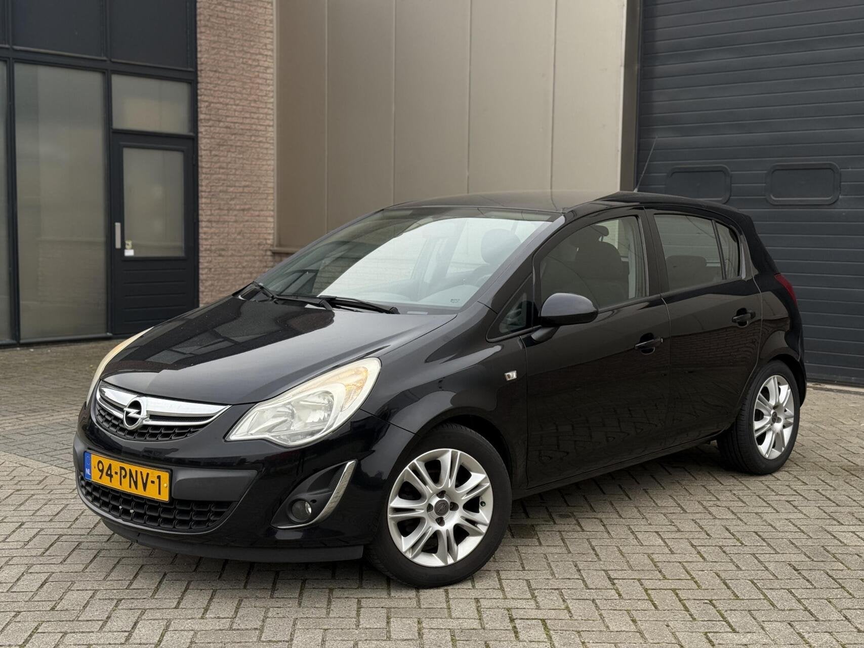 Opel Corsa 1.2-16V 5-DRS 2011 Airco/Cruise/Aux NL Auto, Auto's, Voorwielaandrijving, Euro 5, 86 pk, Gebruikt