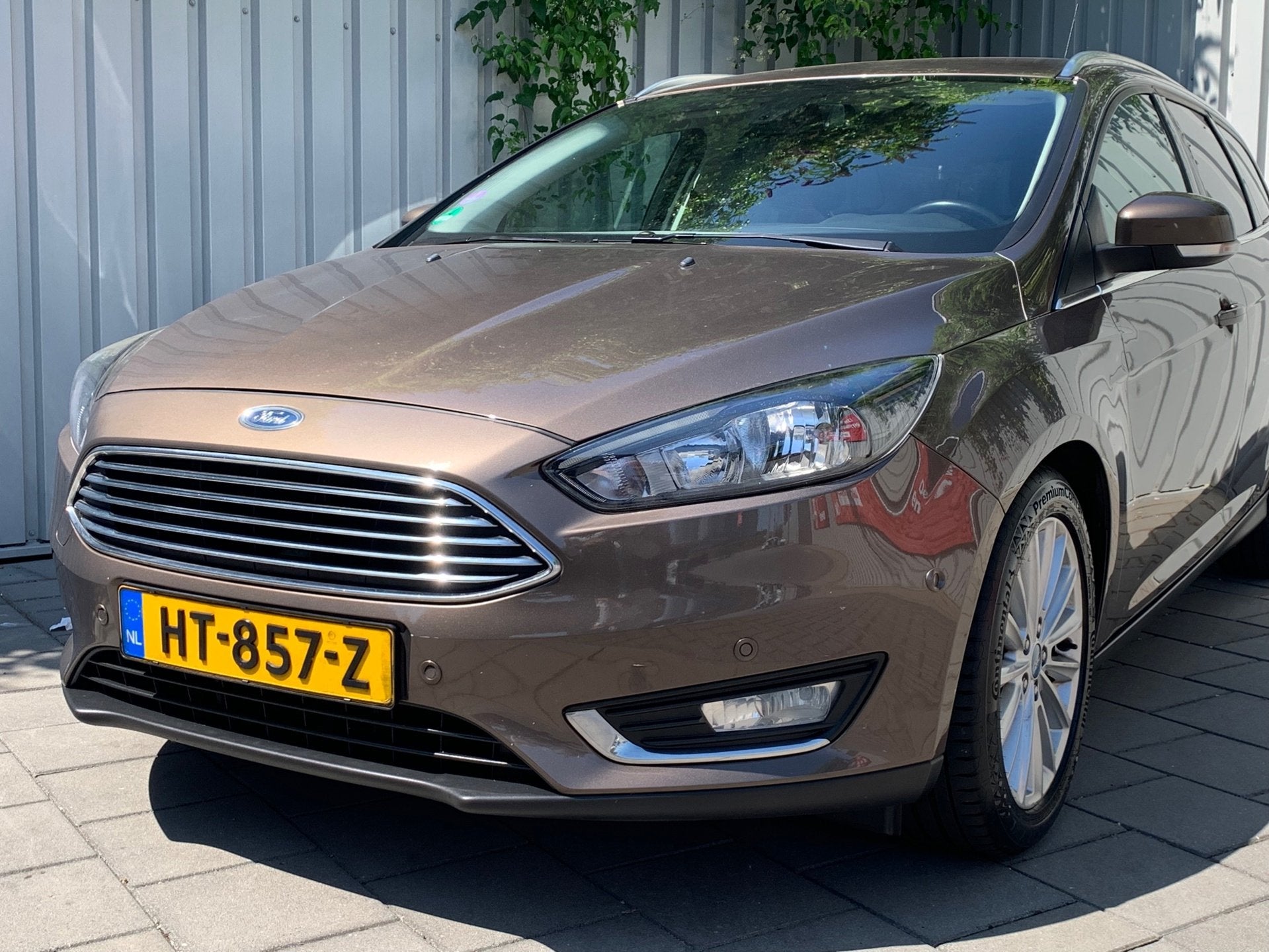 Ford Focus Wagon 1.0 Titanium Edition|Navigatie|Climate Cont, Gebruikt, Bruin, Automatische klimaatregeling, Origineel Nederlands