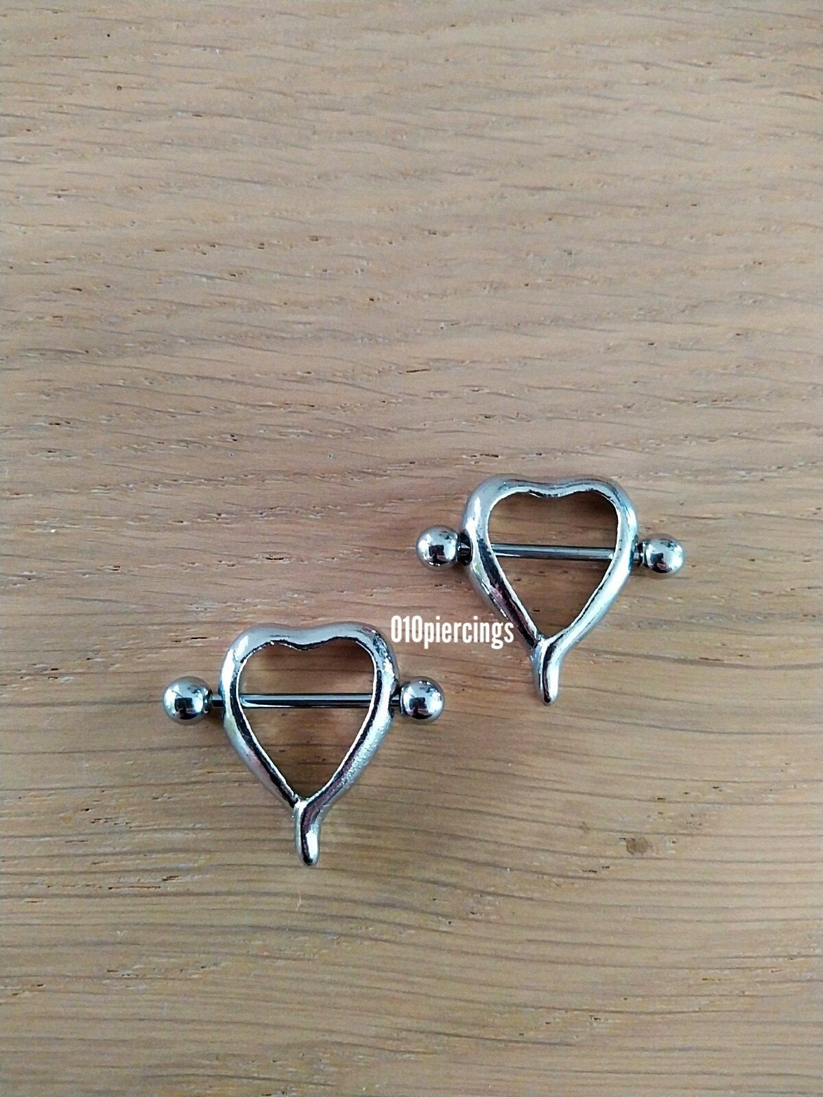 Nieuwe tepelpiercing. Hartje., Ophalen of Verzenden, Zo goed als nieuw, Staal
