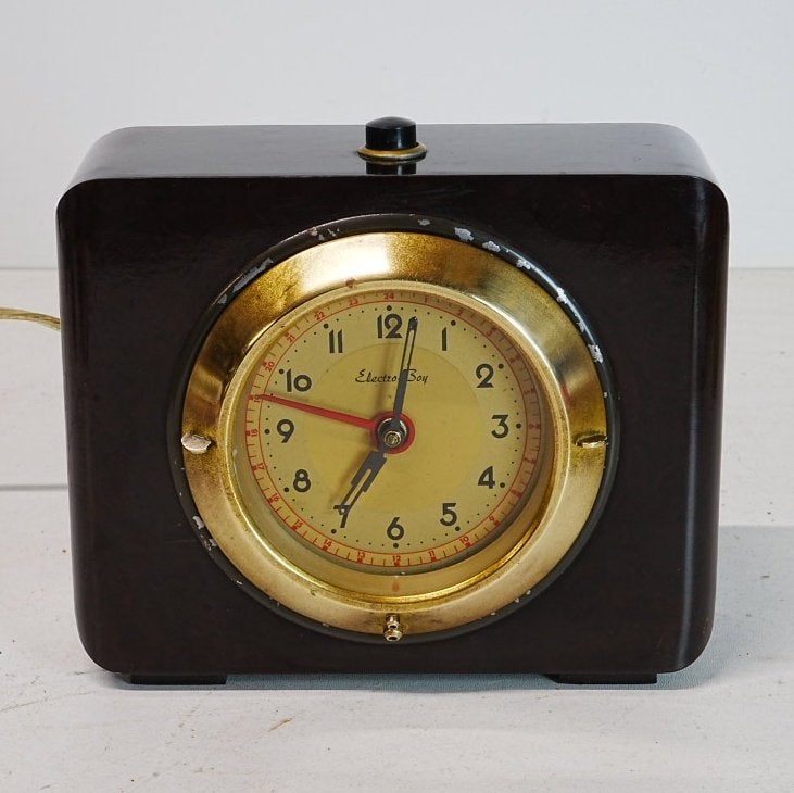 Vintage jaren 60 art deco bakeliet klok., Ophalen of Verzenden, Zo goed als nieuw, Tafelklok