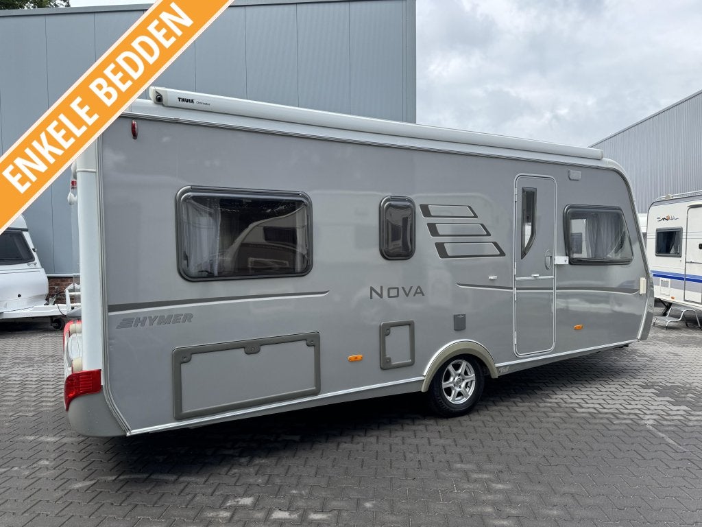 Eriba Nova 530 E / enkele bedden / cassette luifel, Caravans en Kamperen, Caravans, Rondzit, Bedrijf, Schokbreker, 5 tot 6 meter
