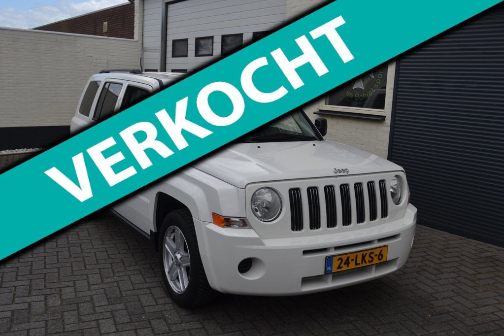 Jeep Patriot 2.4 Sport Liberty 4x4 cruise, Auto's, Jeep, Gebruikt, Zwart, 4 cilinders, 1465 kg