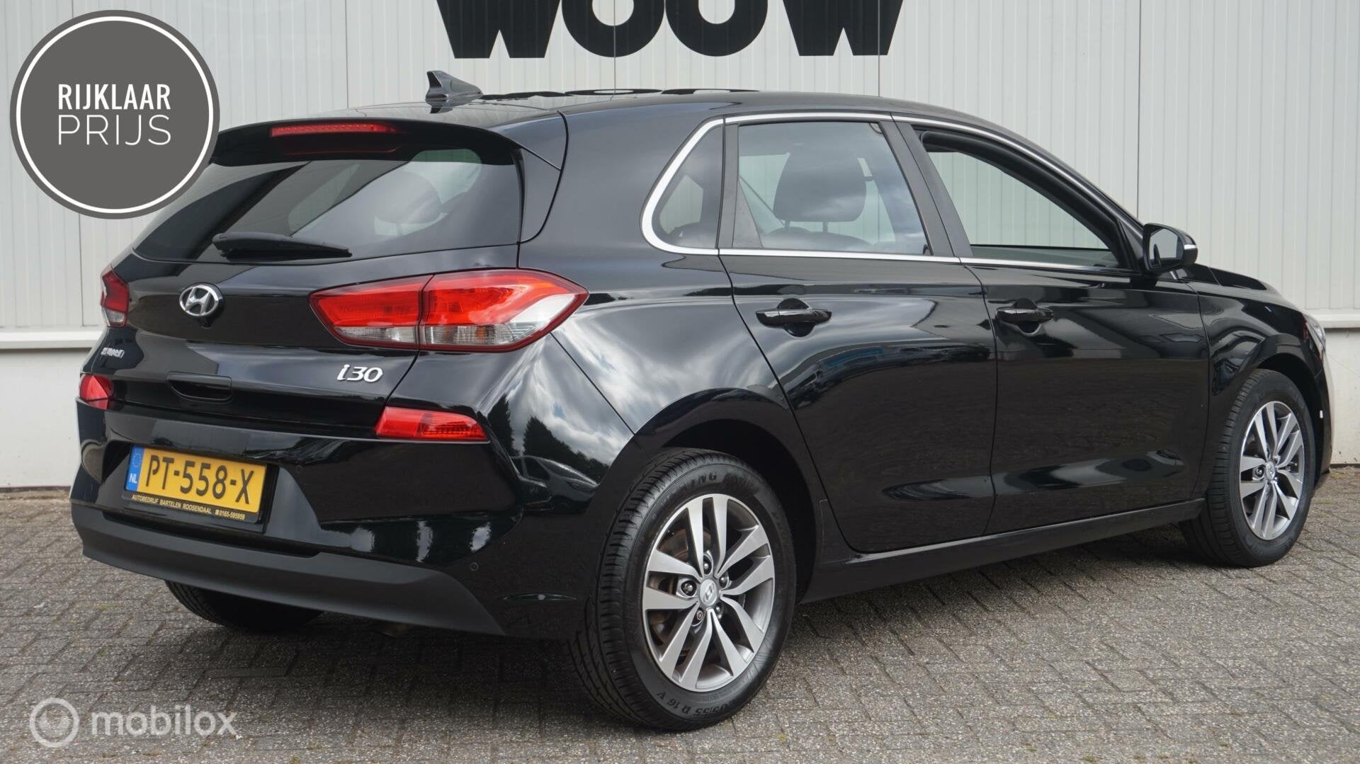 Hyundai i30 1.0 T-GDI Navigatie | Climate Control | Cruise C, Auto's, Stof, Met garantie (alle), Zwart, Origineel Nederlands