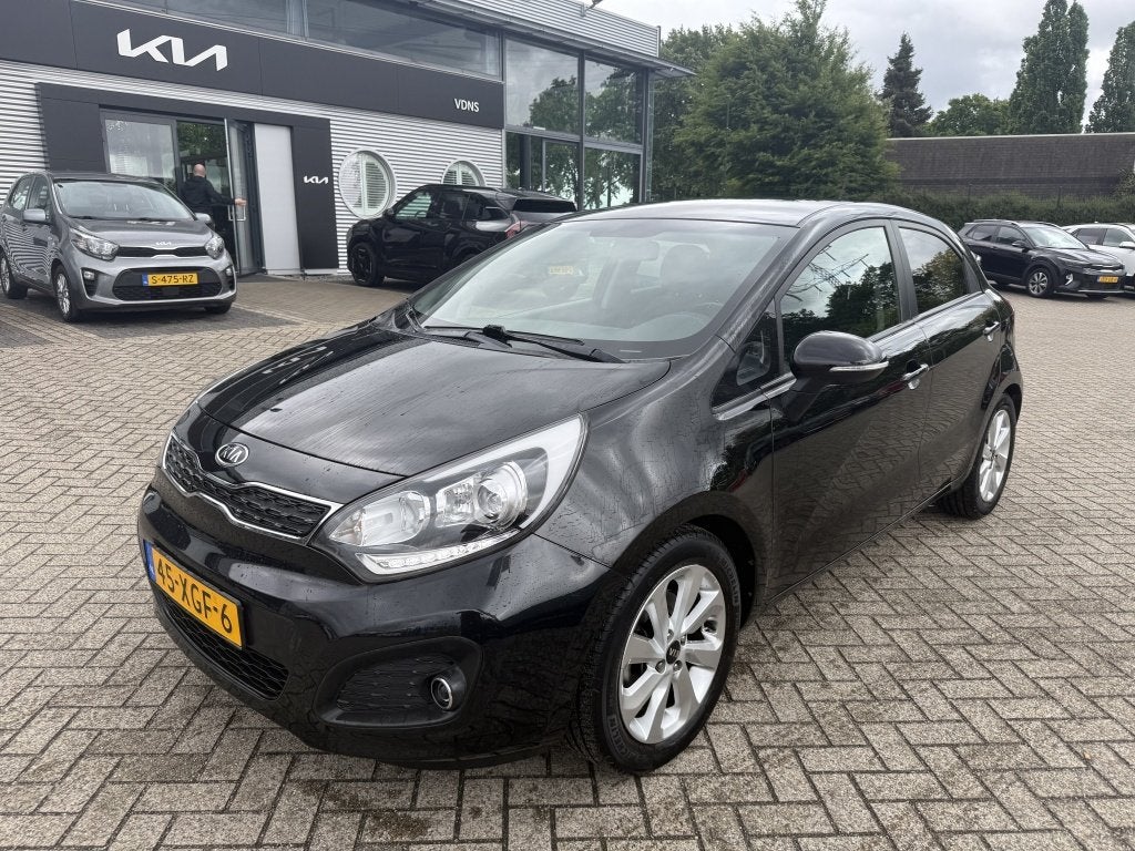 Kia Rio 1.4 CVVT Super Pack / UNIEKE AUTO / ORIGINEEL NAVI-C, Auto's, Euro 5, 450 kg, 1396 cc, Automatische klimaatregeling