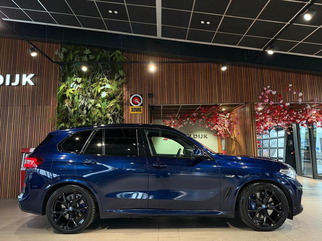 BMW X5 X5 xDrive45e M Sport trekhaak 360cam, Auto's, Stof, Gebruikt, 394 pk, Blauw