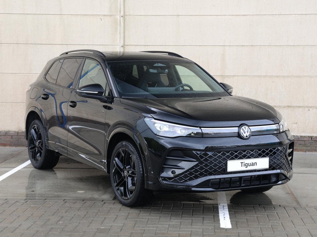 Volkswagen Tiguan R-Line Edition 1.5 eHybrid 204 PK | Naviga, Auto's, Volkswagen, Stof, 150 pk, Zwart, Origineel Nederlands