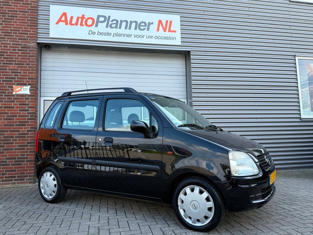 Opel Agila 1.2-16V Comfort! APK 03-2027! Lage kmstand!, Auto's, Voorwielaandrijving, Gebruikt, 31 €/maand, Zwart