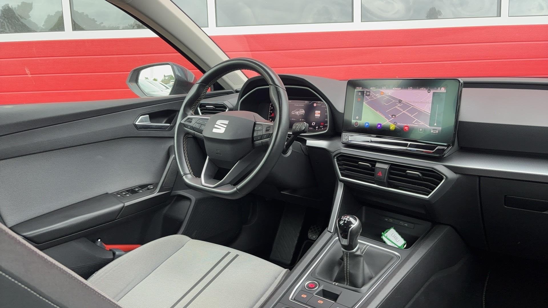 SEAT Leon Sportstourer 1.0 TSI Style Business Intense TREKHA, Auto's, Stof, Gebruikt, Euro 6, Leon