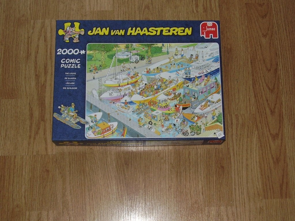 Jan van Haasteren - De Sluizen - (2000 stuks), Ophalen of Verzenden, Meer dan 1500 stukjes, Zo goed als nieuw, Legpuzzel