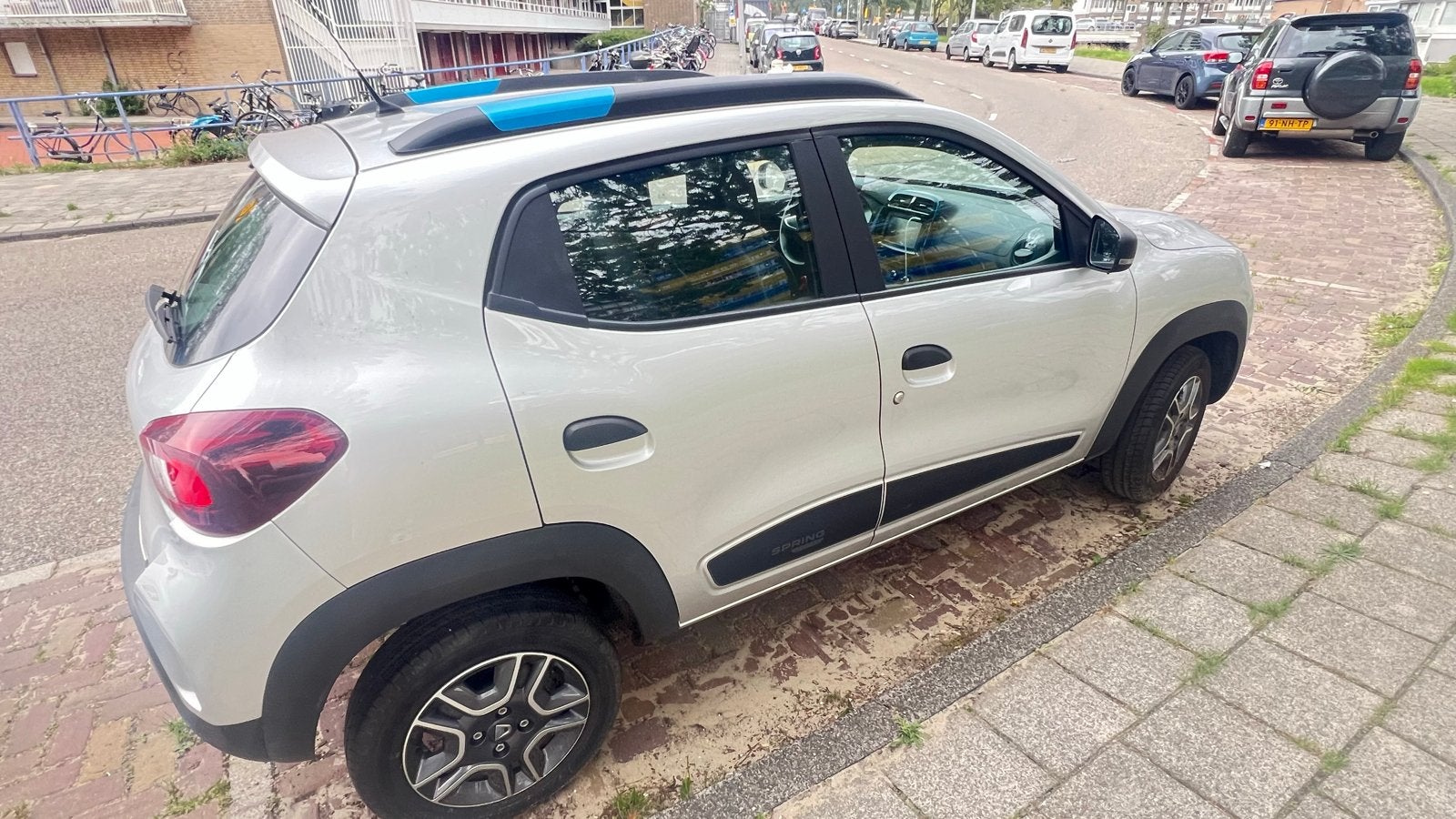 Dacia Spring Electric 45 2022 Grijs, Auto's, Zwart, 920 kg, 38 min, 4 stoelen