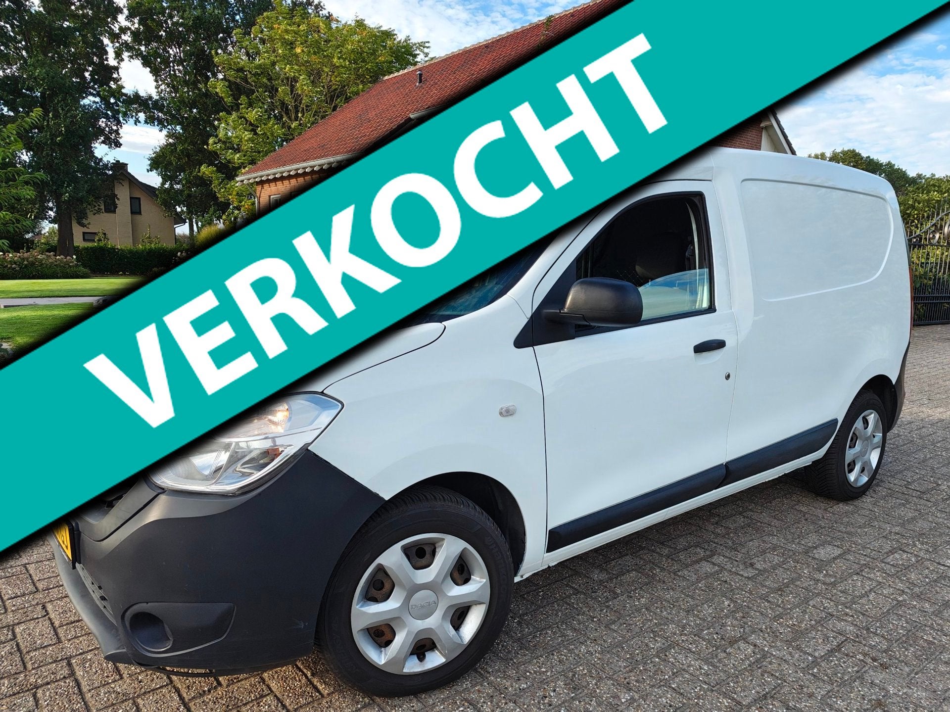 Dacia Dokker 1.6i Benzine met Zijdeur, Trekhaak en Camera !, Auto's, Gebruikt, 4 cilinders, Wit, Handgeschakeld