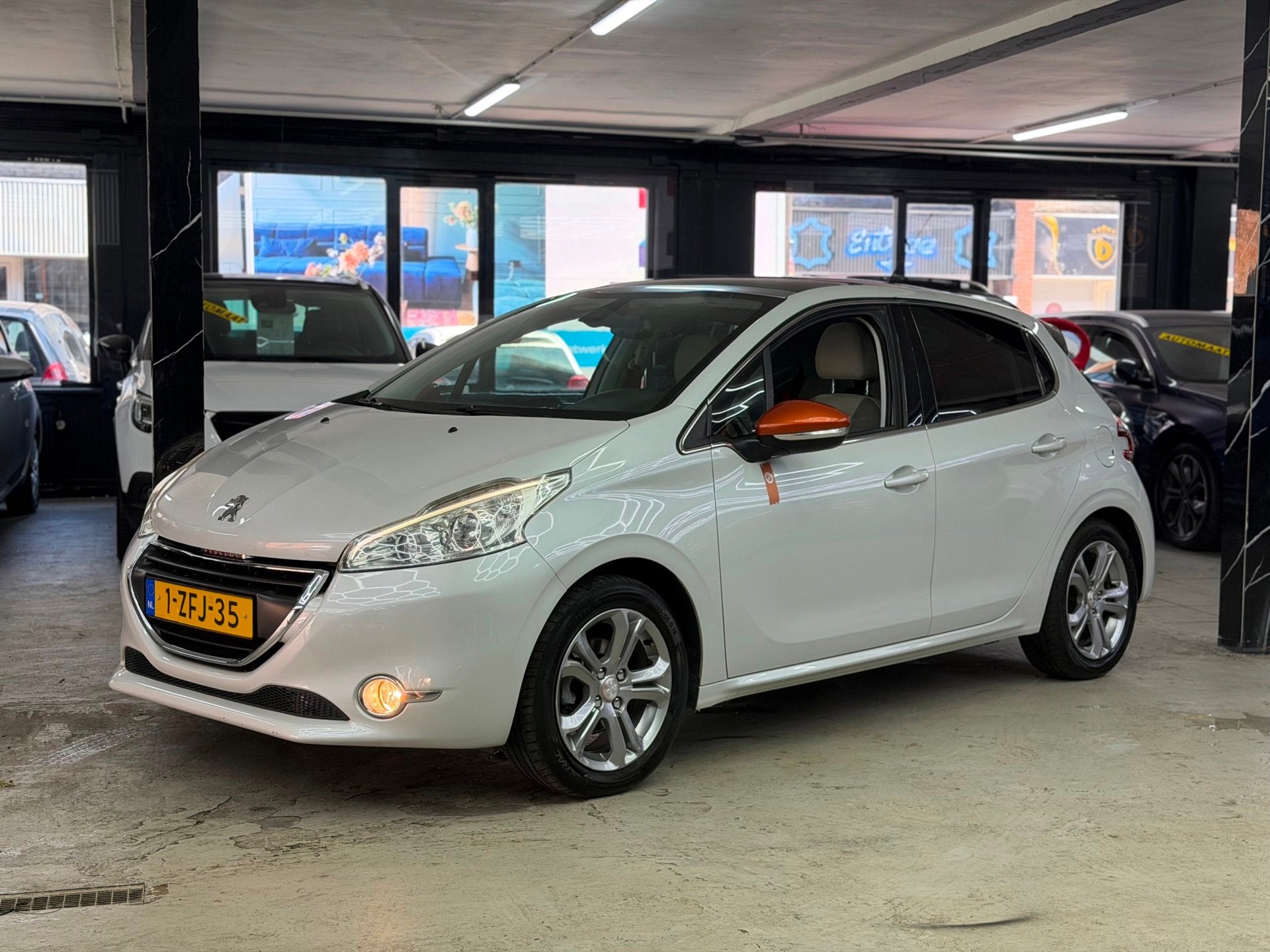 Peugeot 208 1.2 e-VTi Roland Garros Pano | Automaat | Navi, 1199 cc, 82 pk, Wit, 3 cilinders