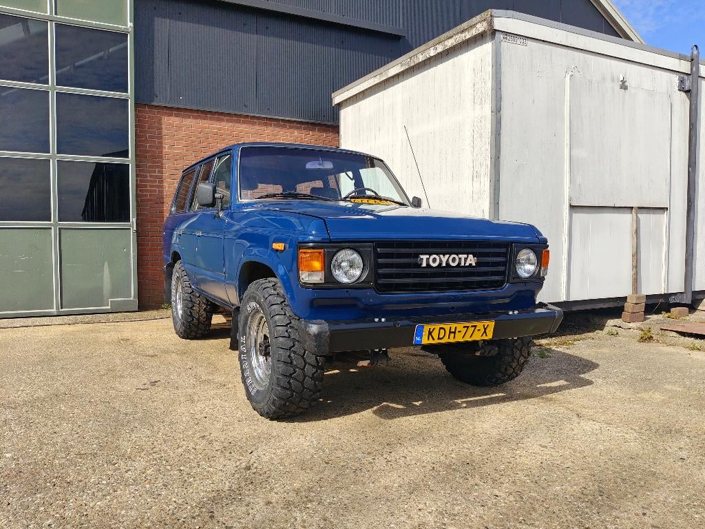 Toyota Landcruiser HJ60 1981 Wegenbelasting /milieuzone vrij, Auto's, Trekhaak, Blauw, Leder en Stof, Bruin