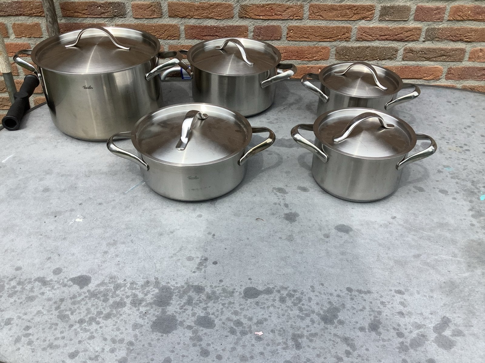 Fissler pannenset 5-delig - RVS, geschikt voor inductie, Huis en Inrichting, Keuken | Potten en Pannen, Gebruikt, Met deksel, Pannenset