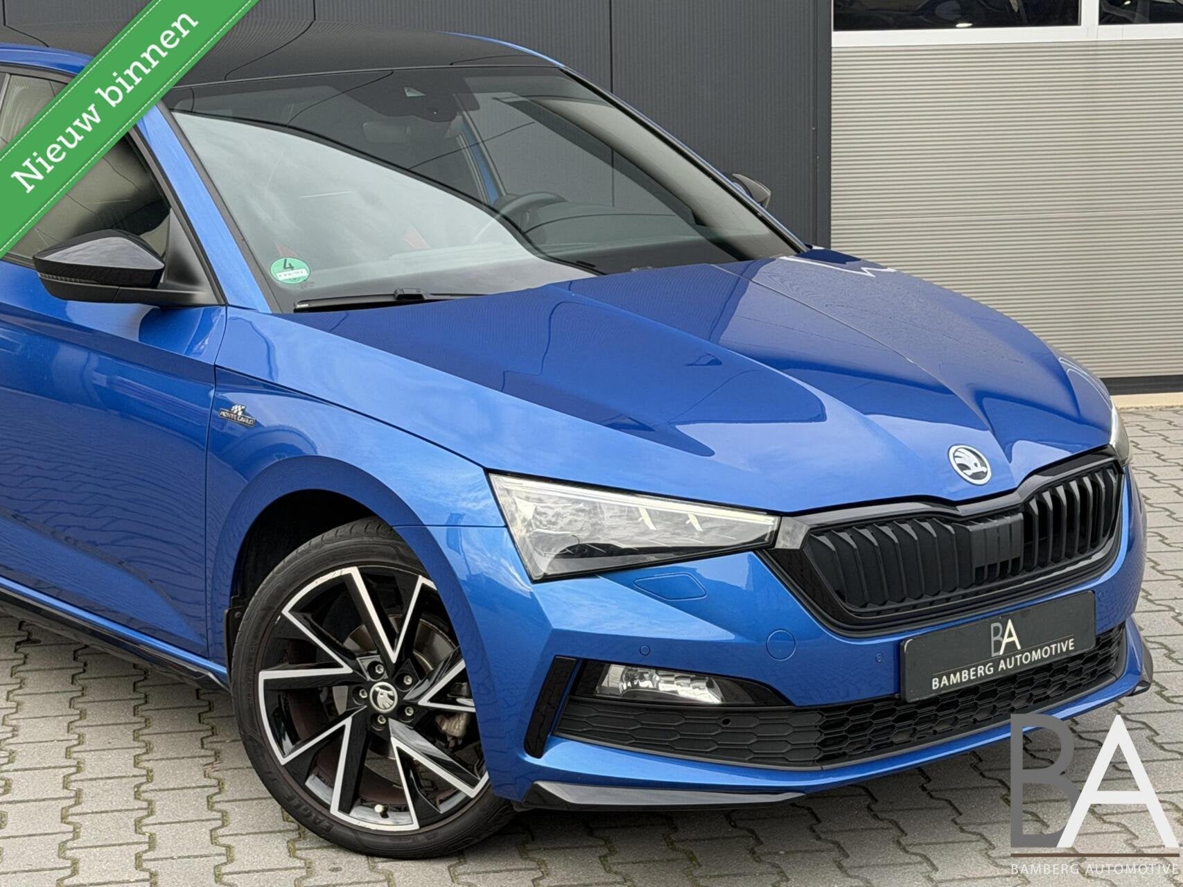 Skoda Scala 1.0 TSI DSG Monte Carlo Pano|carplay|trekhaak, Auto's, Dealer onderhouden, Gebruikt, Zwart, 1232 kg