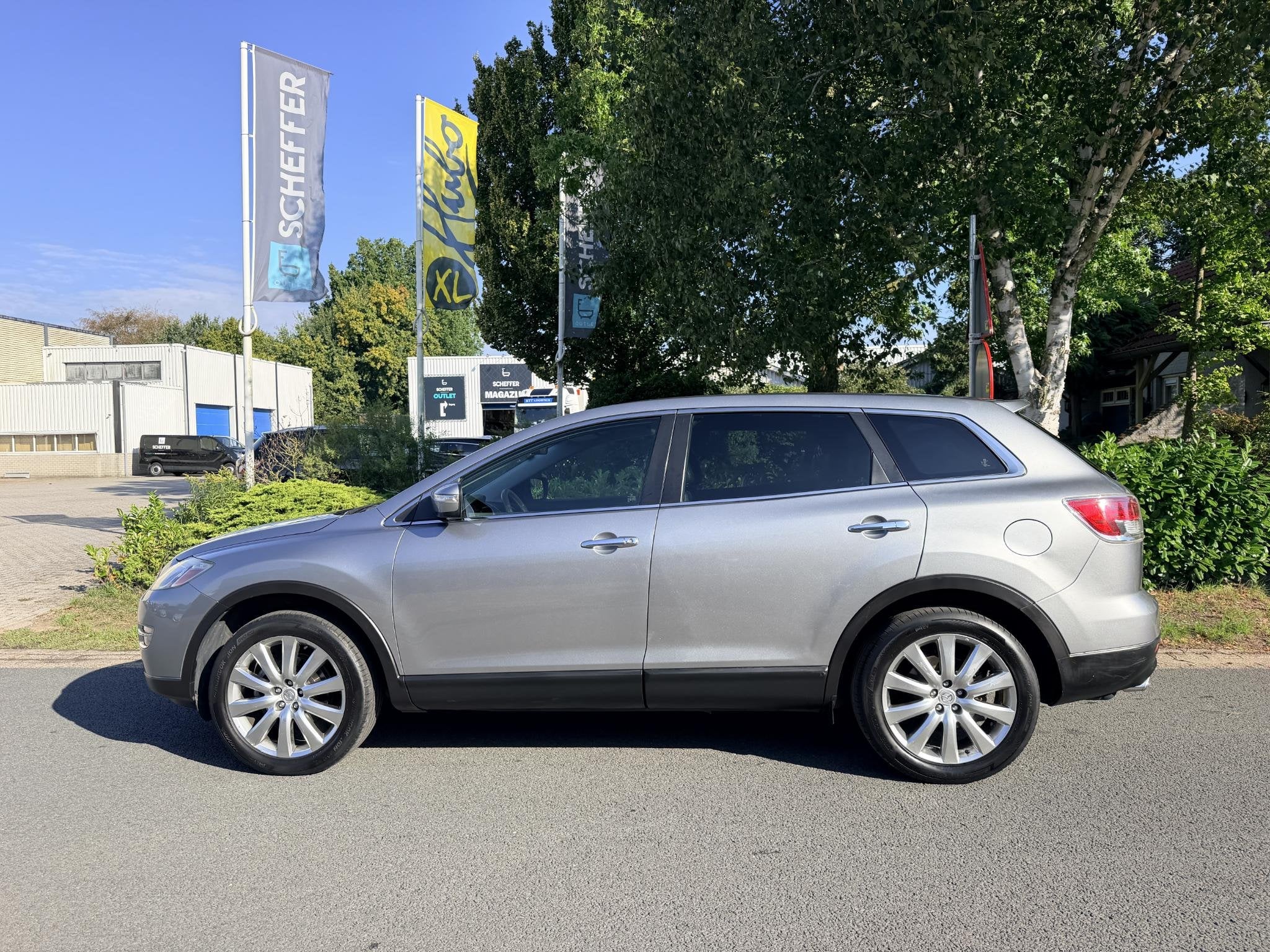 Mazda CX-9 3.7 V6 277PK AUT GT-L 7p Leder•Bose, Auto's, Automaat, Gebruikt, Zwart, 7 stoelen