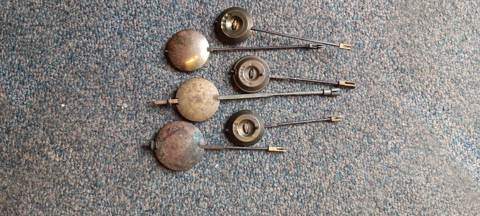 te koop 0ngeveer 25 slingers plus gewichten  bellen en tolle, Antiek en Kunst, Ophalen
