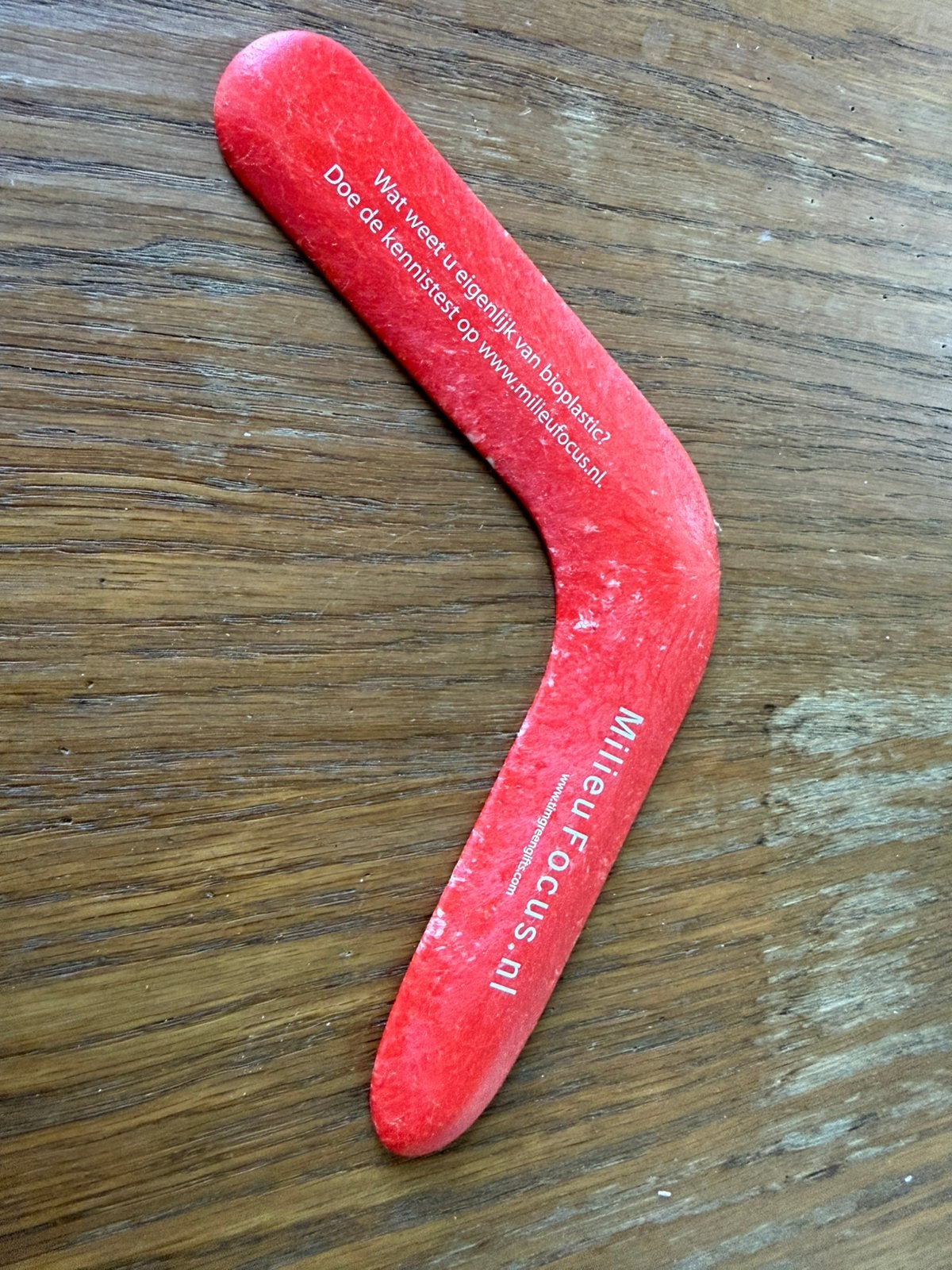Milieufocus bioplastic boomerang, Ophalen of Verzenden, Gebruikt, Gebruiksvoorwerp