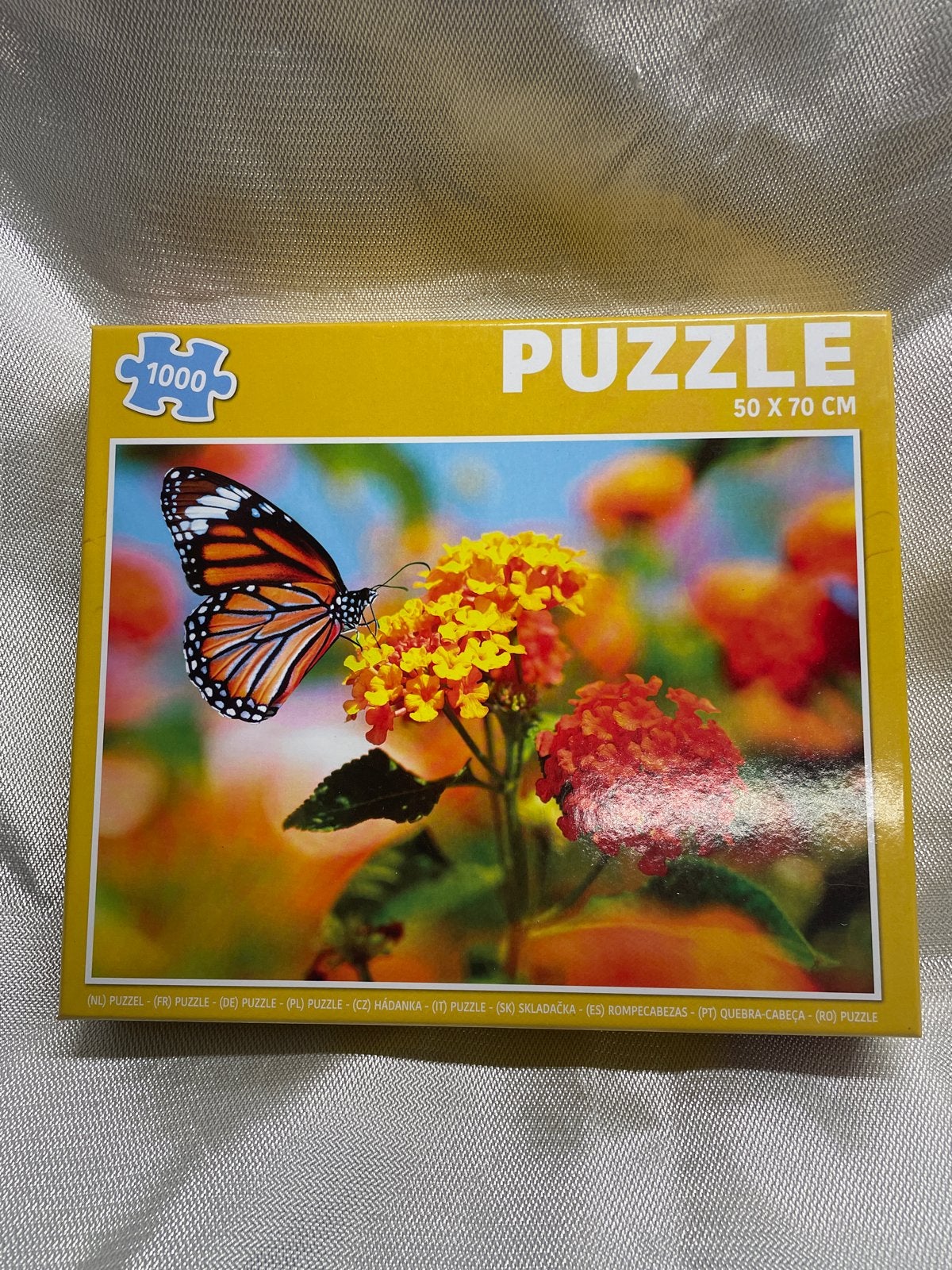 Puzzel 1000 stukjes vlinder op bloem 50x70 cm, Ophalen, 500 t/m 1500 stukjes, Nieuw, Legpuzzel