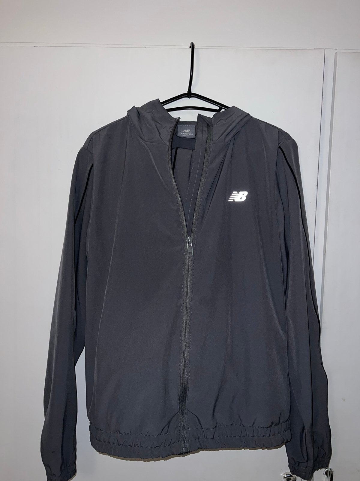 New Balance Reflectief Trainingspak - Zo goed als nieuw, Ophalen of Verzenden, Zo goed als nieuw, Jongen of Meisje, Setje