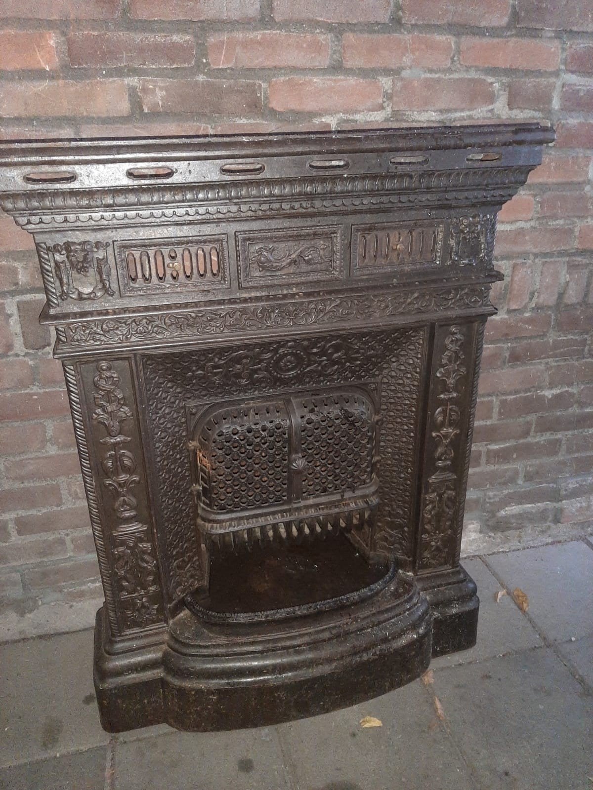antieke Franse kachel, Ophalen