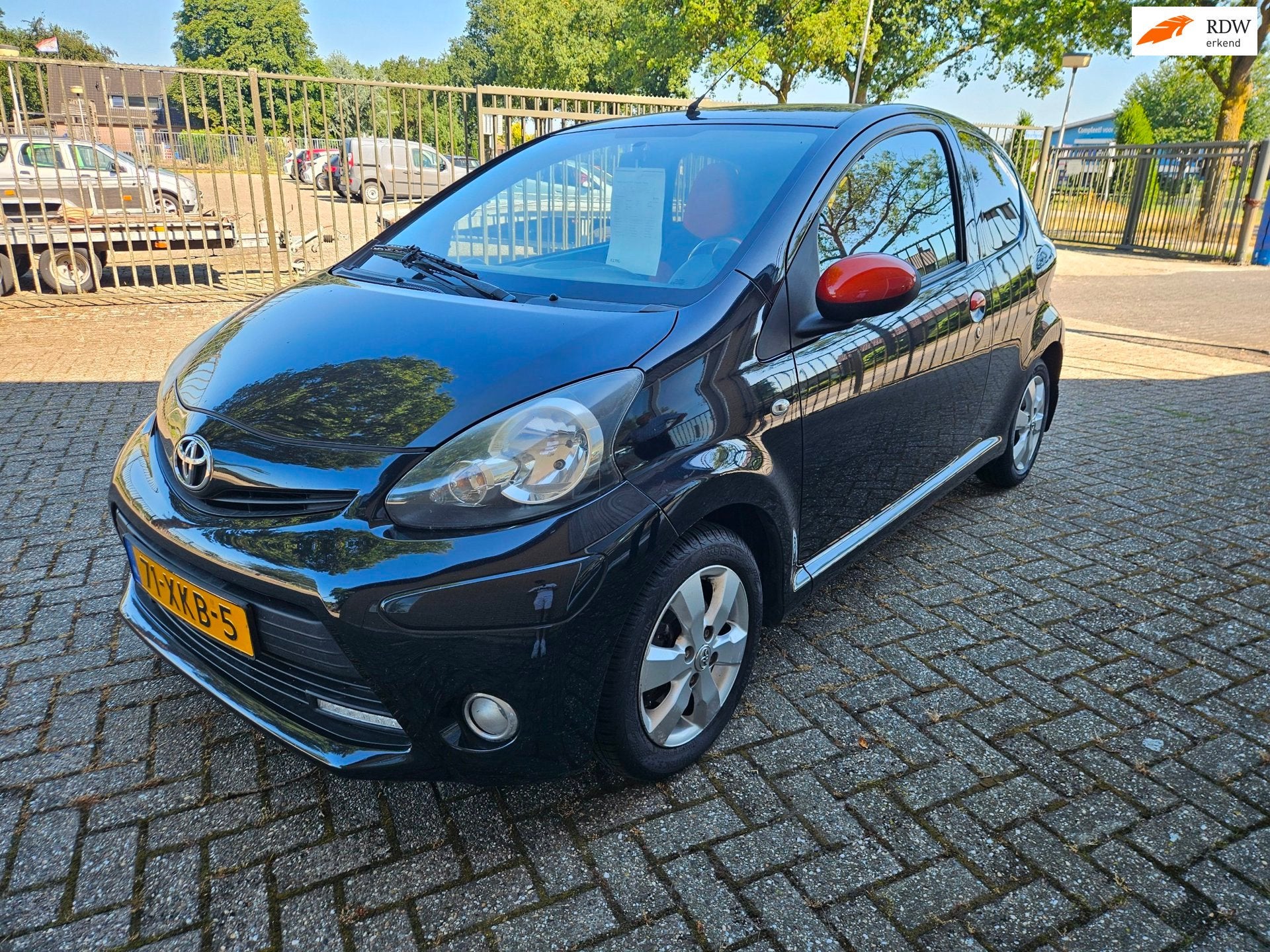 Toyota Aygo 1.0 VVT-i Dynamic Orange, Voorwielaandrijving, Euro 5, Gebruikt, 4 stoelen