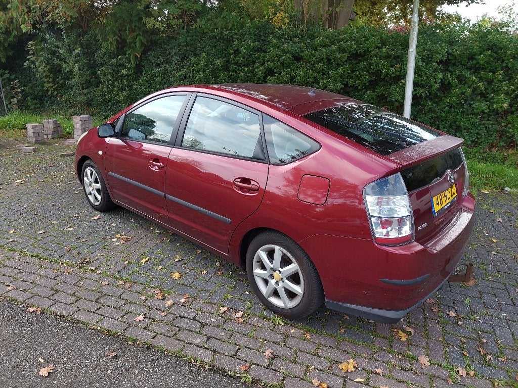 Toyota Prius 1.5 HSD 2004 Rood, Auto's, 4 cilinders, 23 km/l, Origineel Nederlands, Grijs