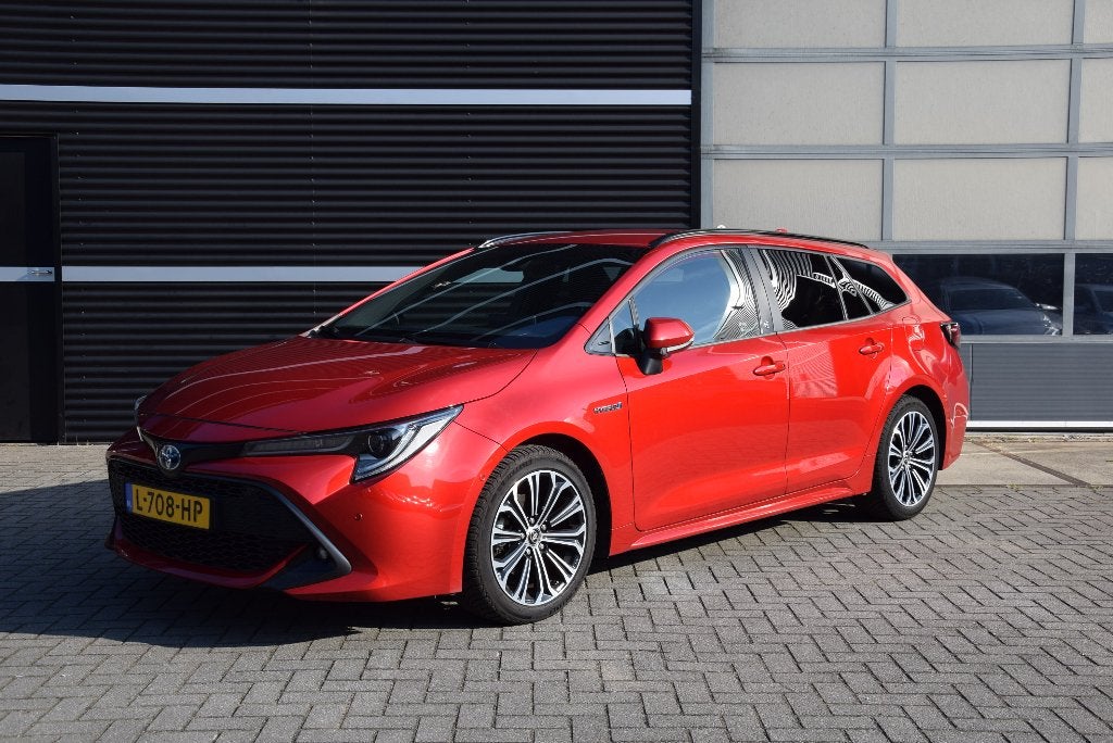 Toyota Corolla TS 1.8 Hybrid Executive teamD zeer luxe 122pk, Auto's, Toyota, 4 cilinders, Lichtsensor, 98 pk, Stationwagon