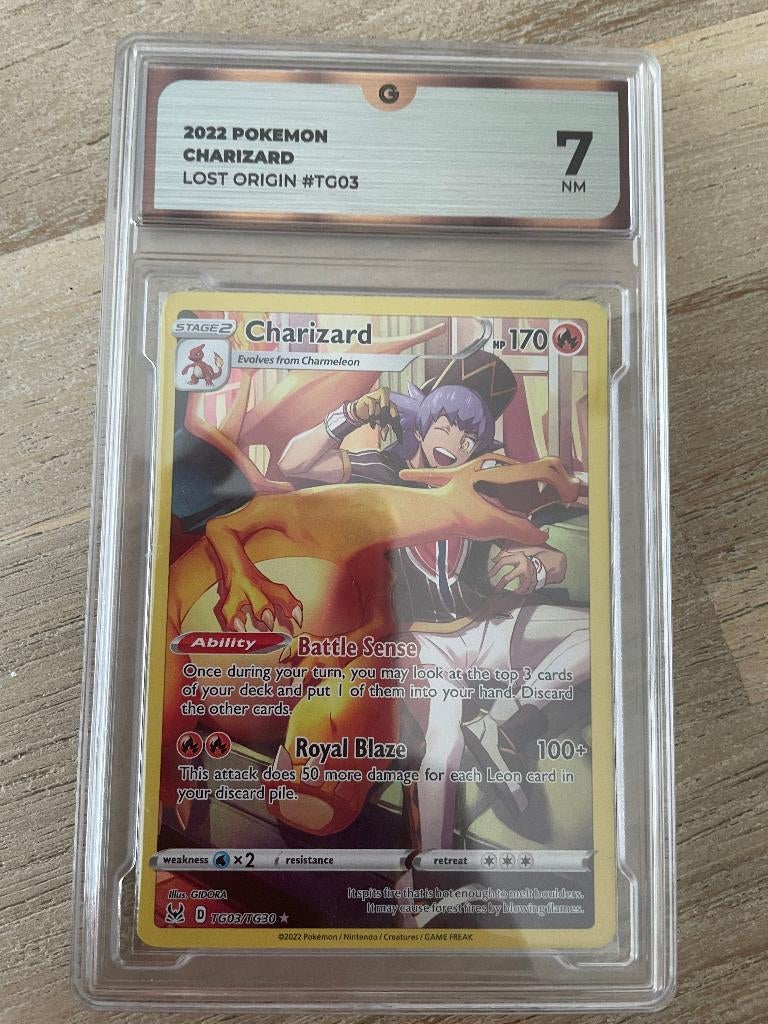 Graded Pokemon kaart - Charizard grade 7, Ophalen of Verzenden, Zo goed als nieuw, Losse kaart