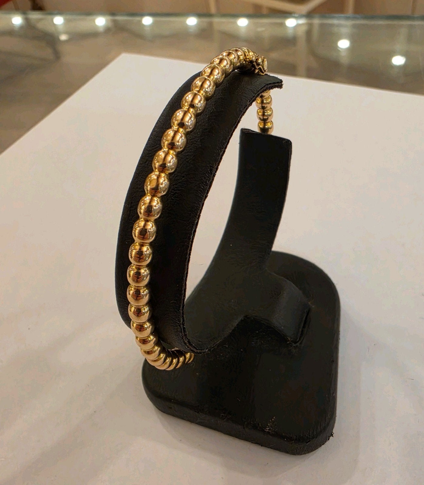 9 karaats gouden bangle / slavenarmband bolletjes geelgoud, Gebruikt, Ophalen of Verzenden, Goud, Goud