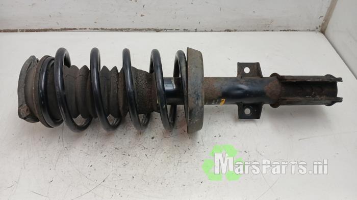 Schokdemperpoot links-voor van een Saab 9-5