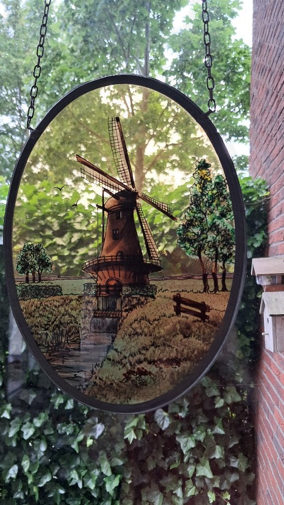 Glas in lood raamhanger., Ophalen