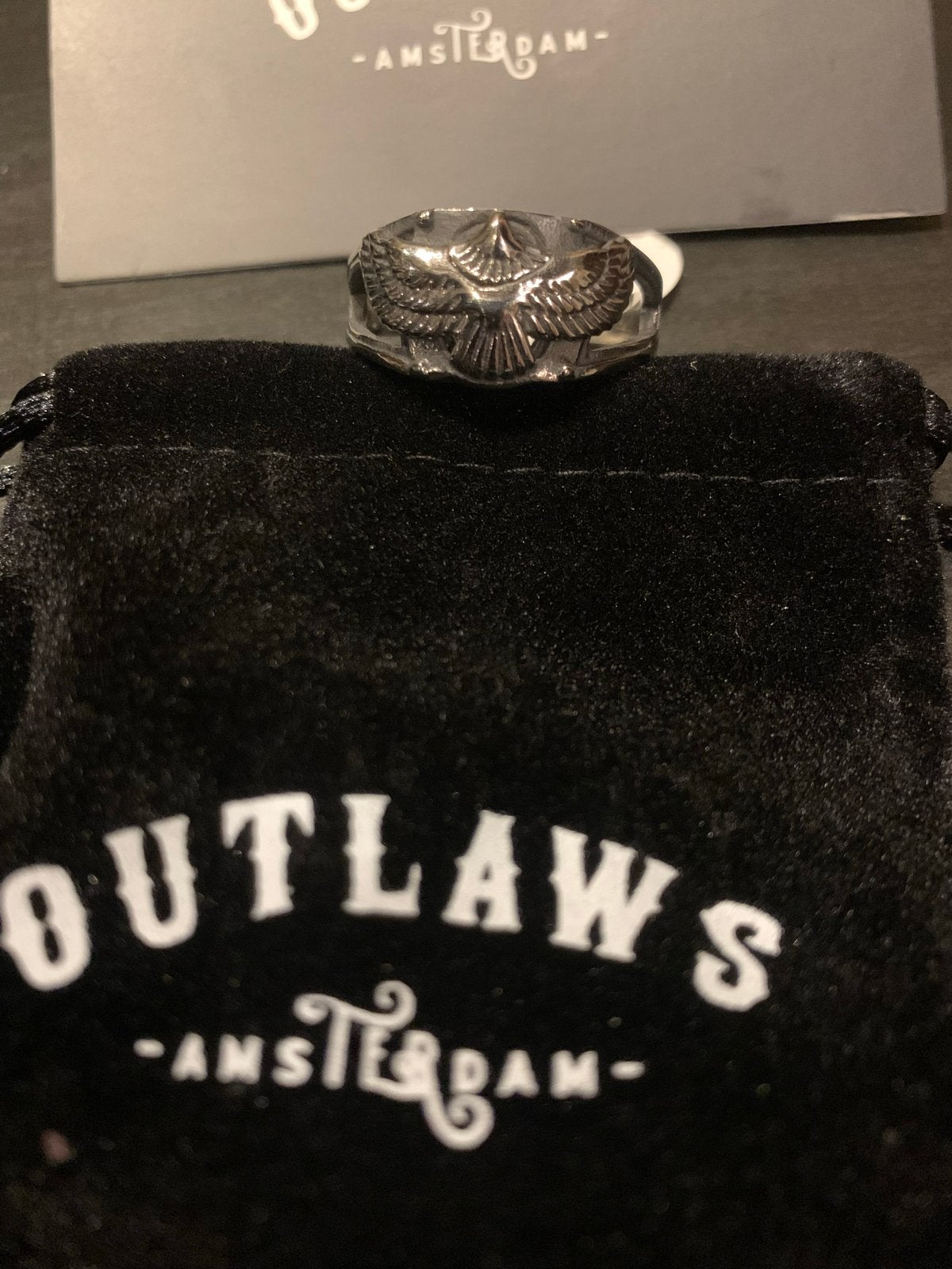 Outlaws Amsterdam Harley Davidson Flying Bird RVS ring, Sieraden, Tassen en Uiterlijk, Ringen, Gebruikt, IJzer of Staal, Heer