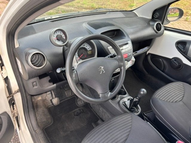 Peugeot 107 1.0 Active 5-Drs Airco Electric pakket Audio-CD/, Auto's, Voorwielaandrijving, Stof, Gebruikt, Zwart