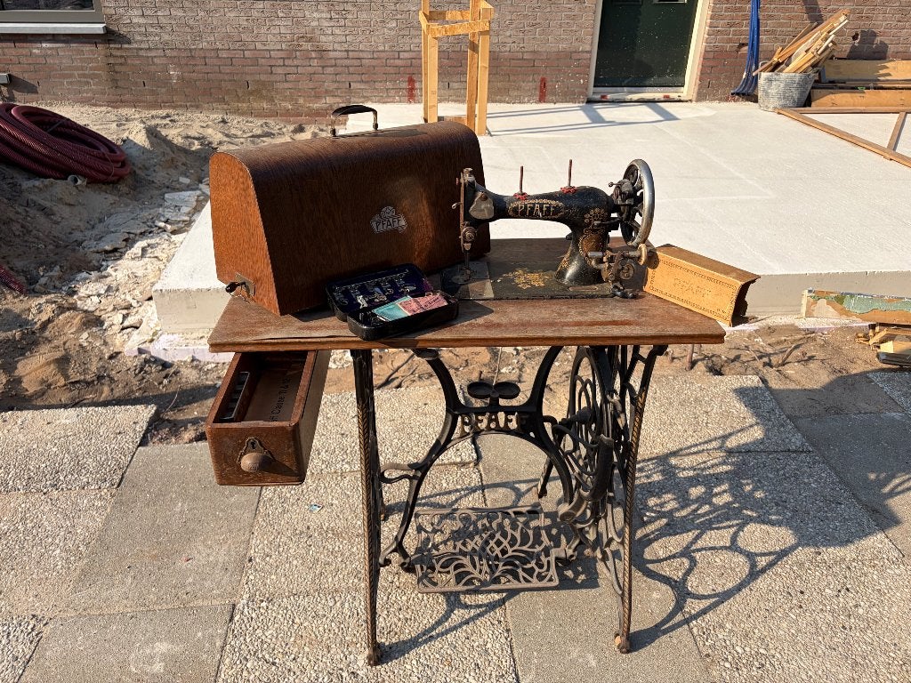 Naaimachine, Ophalen