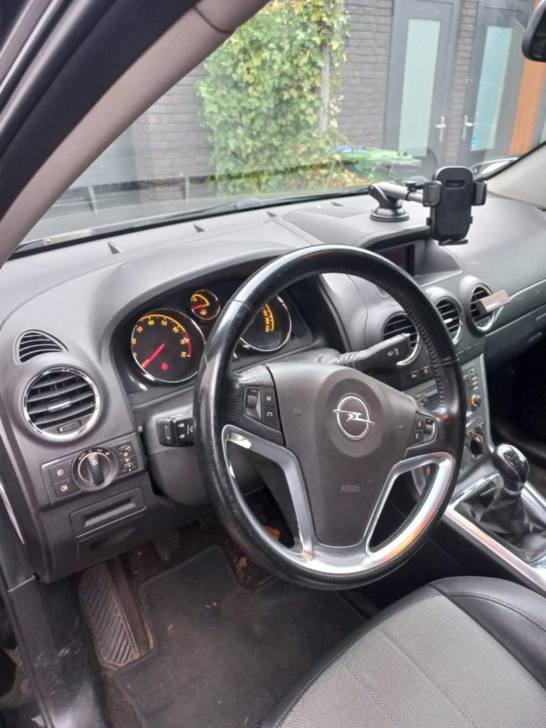 Opel Antara 2.4 123KW 2X4 2011 Zwart, Auto's, Opel, Voorwielaandrijving, 4 cilinders, 1650 kg, Leder en Stof