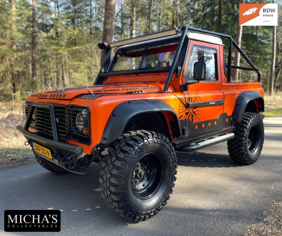 Land Rover Defender 2.0 mpi Benzine 1997, Auto's, Land Rover, 1994 cc, 136 pk, Zwart, Leder