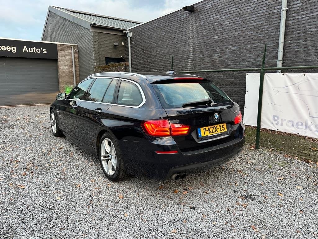 Foto 7 van BMW 5-serie Touring 520i High Executive netteauto/keurigonde