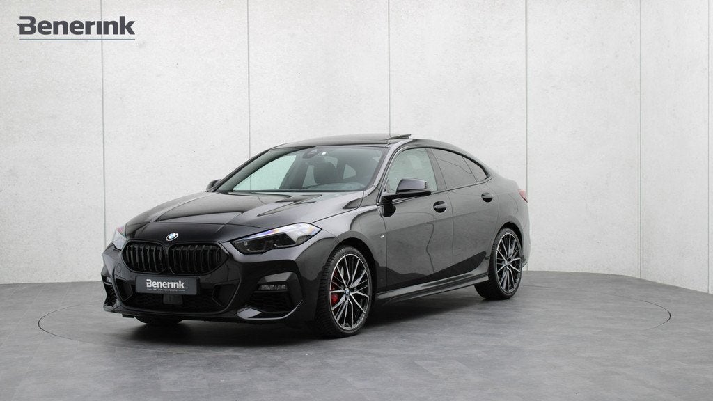 BMW 2 Serie Gran Coupé 220i M-Sport | Head-up | Panoramadak, Auto's, BMW, Gebruikt, Leder en Stof, Zwart, Sedan