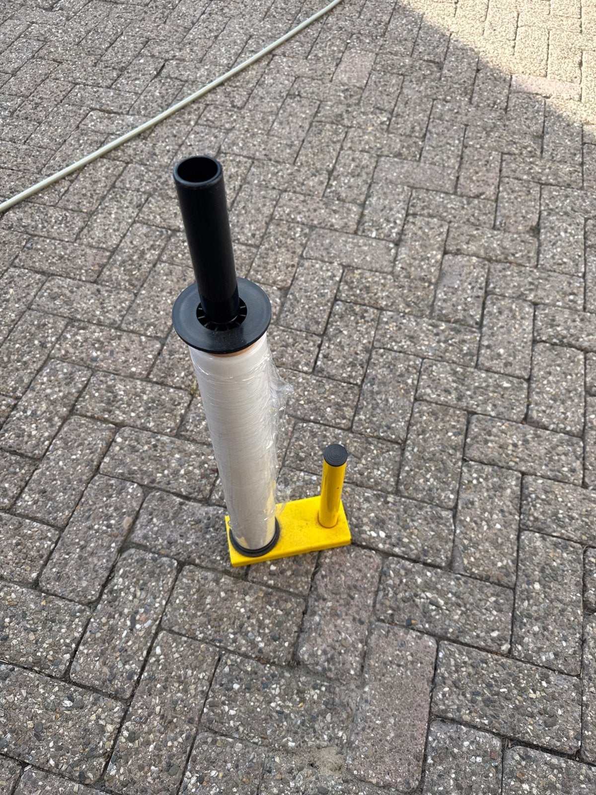Handige foliedispenser met folie, Ophalen
