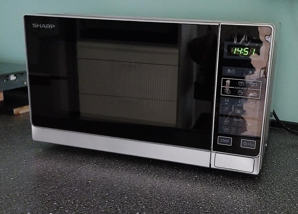 Sharp Combi-magnetron met instructieboekje, Combimagnetron, Gebruikt, Grill, Ophalen of Verzenden
