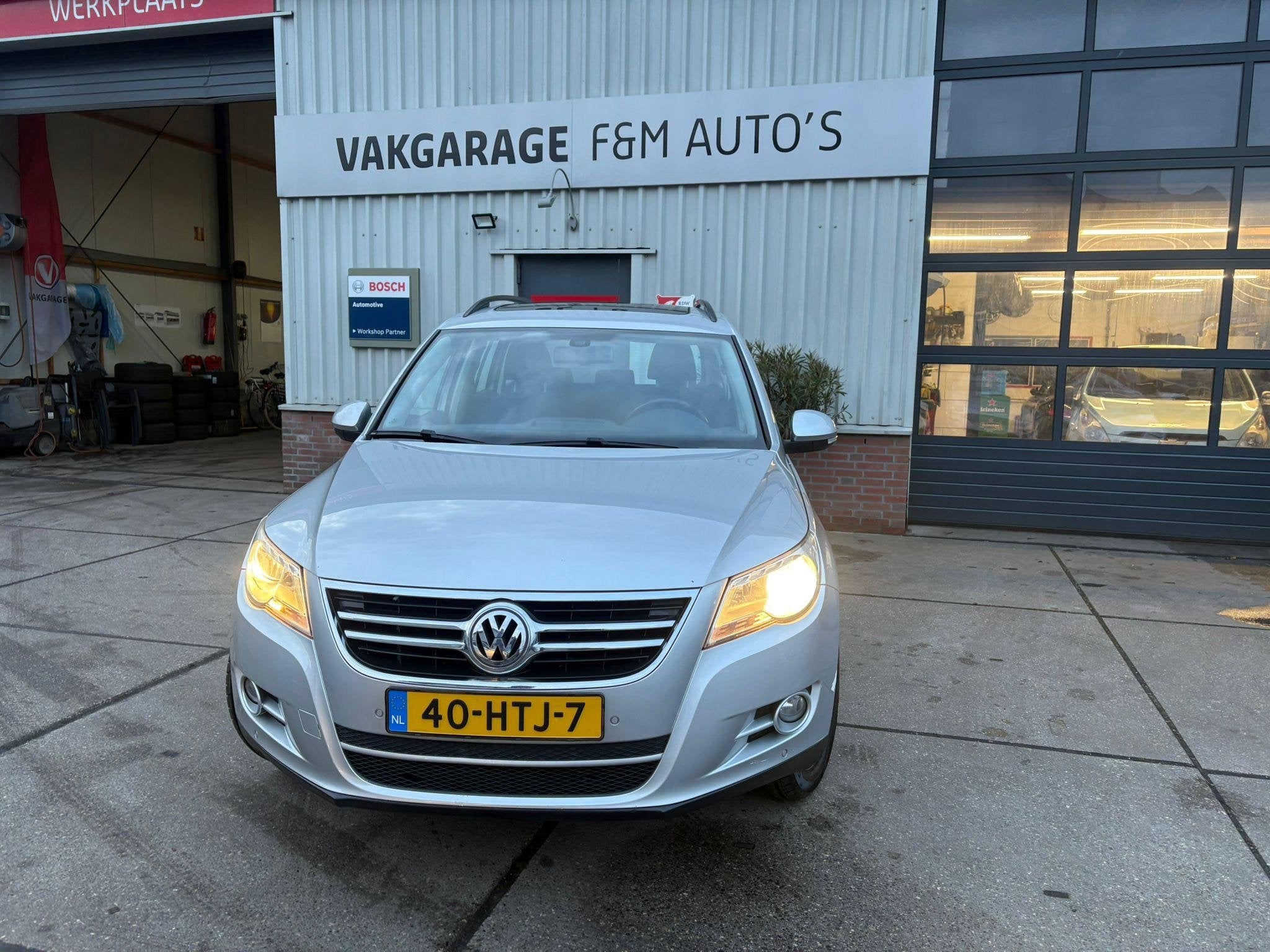 Volkswagen Tiguan 1.4 TSI Comfort&Design Airco, trekhaak, pa, Auto's, Voorwielaandrijving, Euro 5, Stof, Zwart
